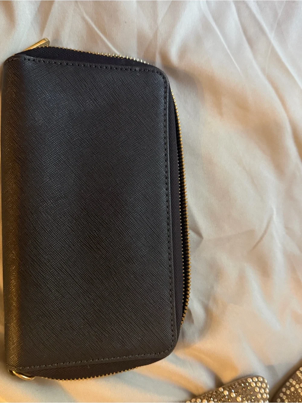 Michael Kors Black Zip-Around women’s Wallet with Gold Hardware
